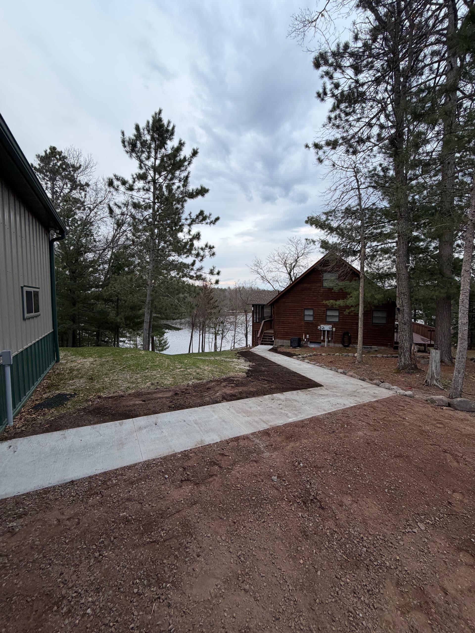 Gallery photos for New Concrete Walkway Connects Shop and Home on Lake Property: Image #3