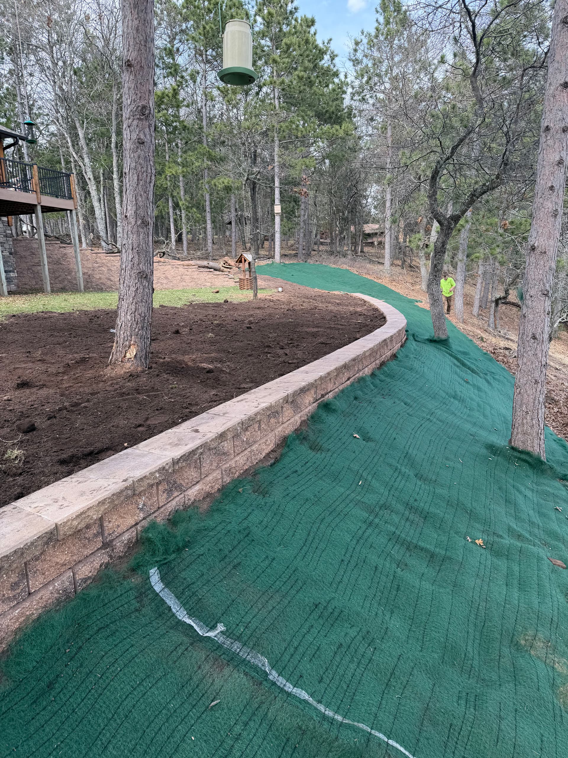 Gallery photos for 115-Foot Block Retaining Wall Replaces Failing Timber Wall on Eroding Hillside: Image #1