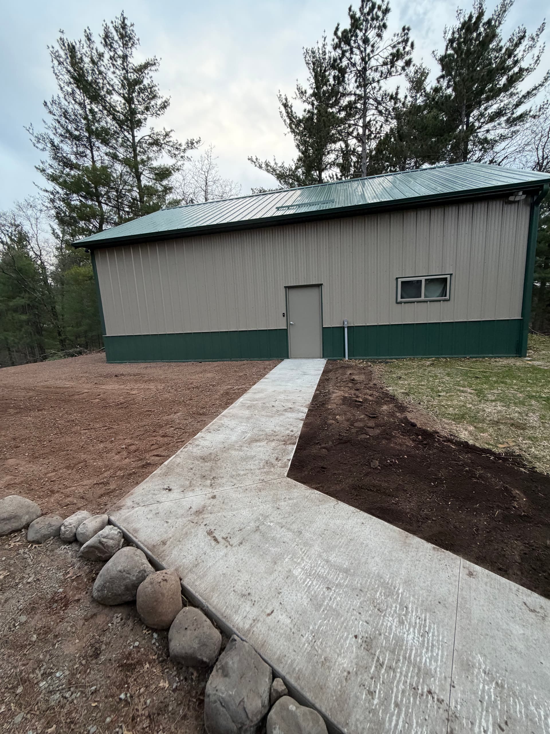 Gallery photos for New Concrete Walkway Connects Shop and Home on Lake Property: Image #2