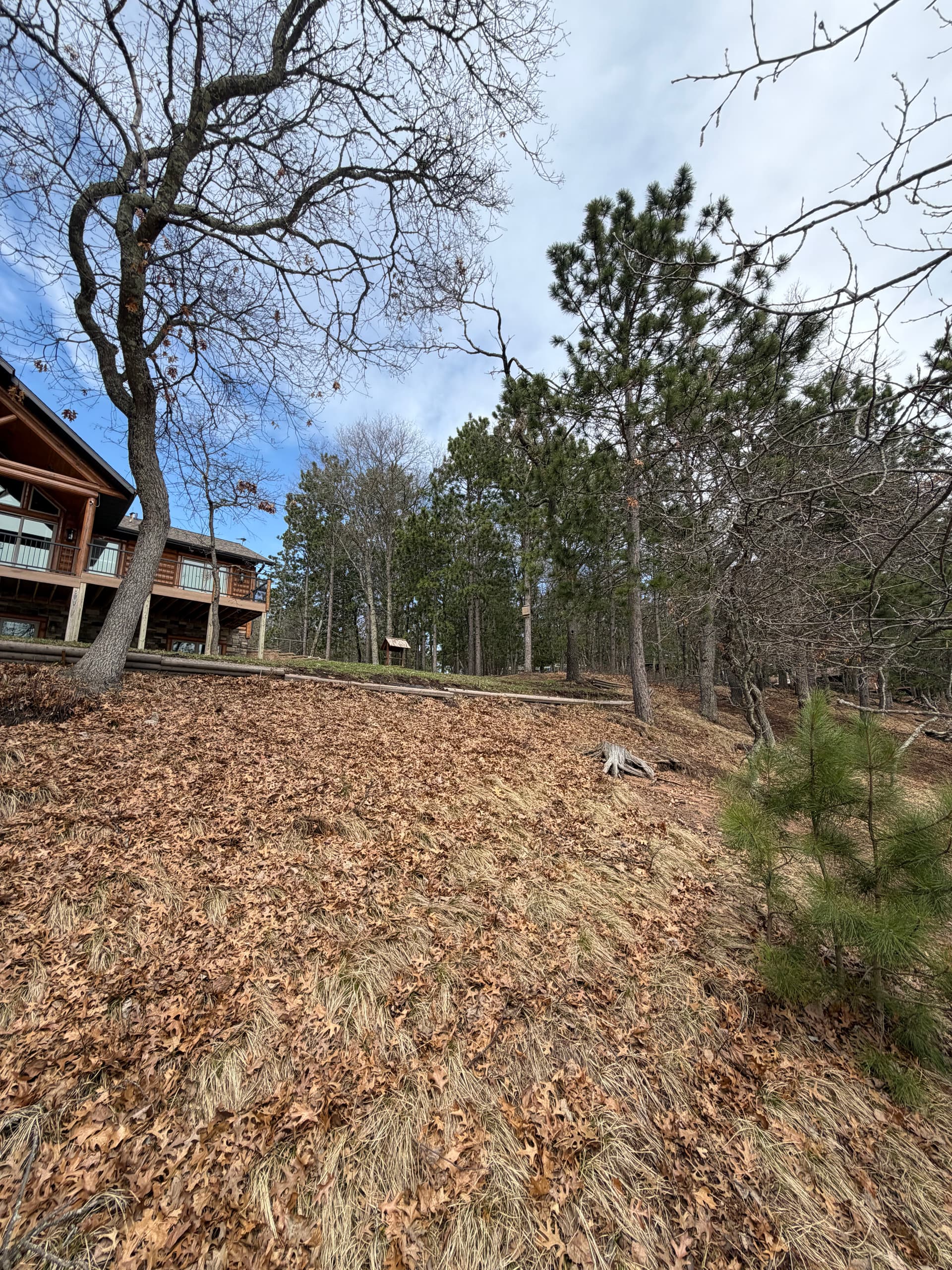 Gallery photos for 115-Foot Block Retaining Wall Replaces Failing Timber Wall on Eroding Hillside: Image #6