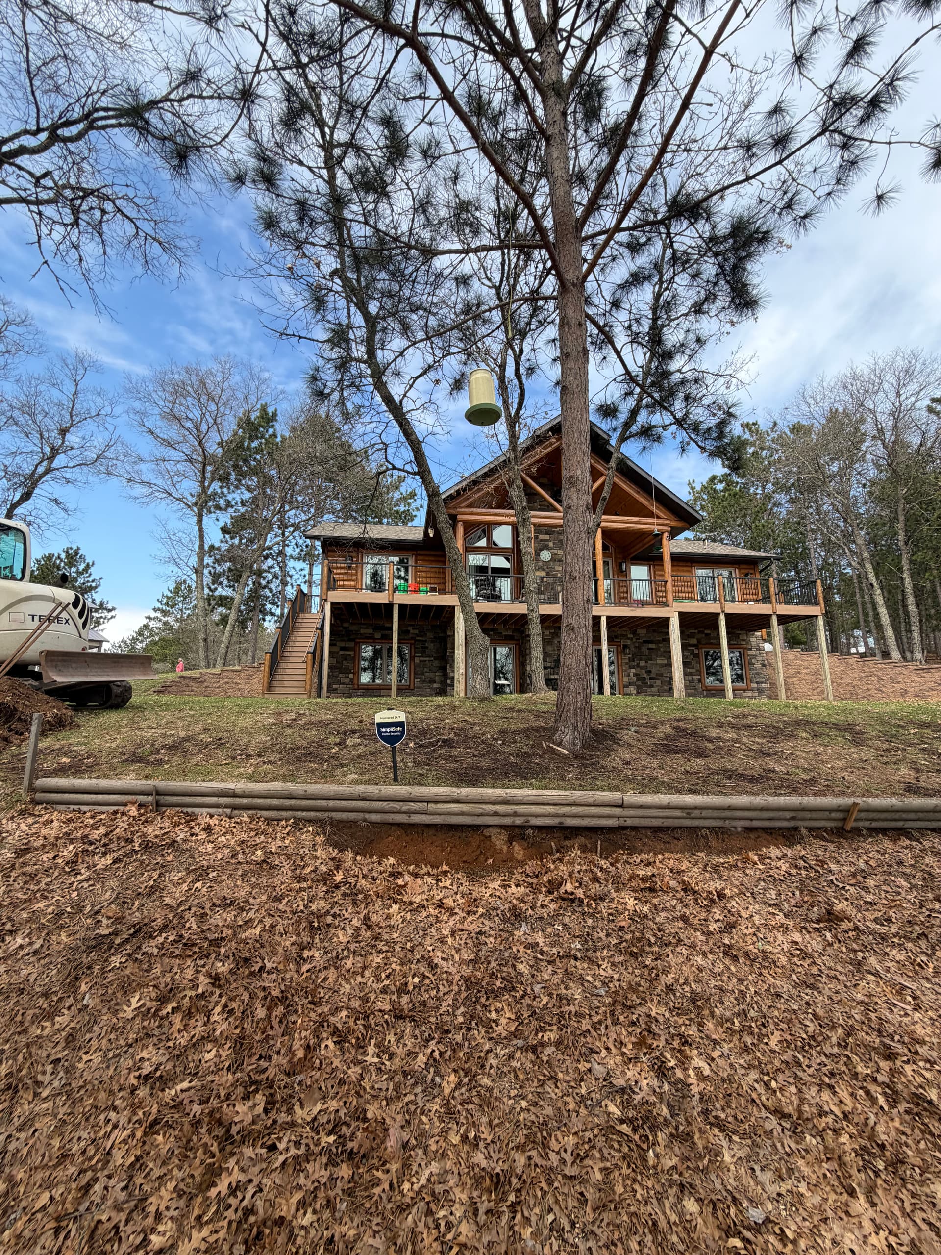 Gallery photos for 115-Foot Block Retaining Wall Replaces Failing Timber Wall on Eroding Hillside: Image #4