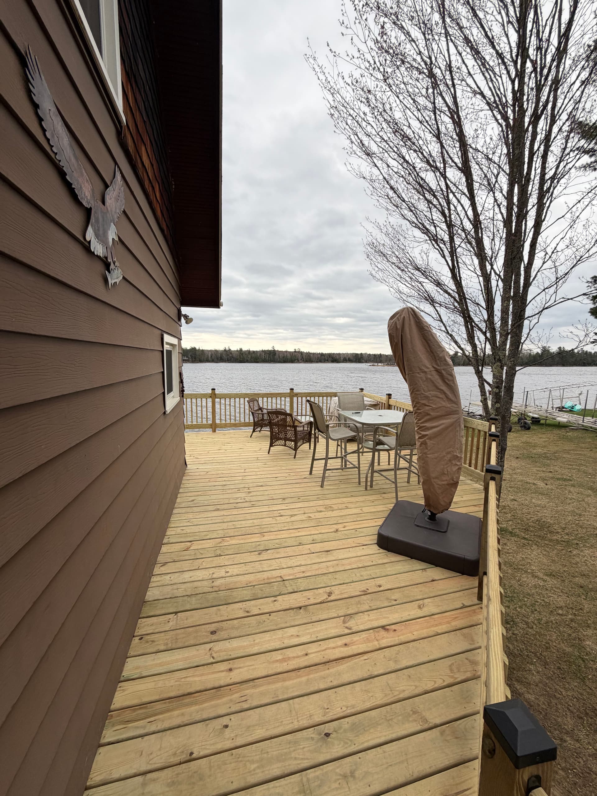 Lakefront Deck Rebuild With New Railings and Redesigned Entry