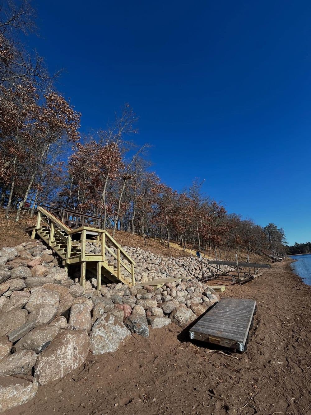 180-Foot Rip Rap Shoreline Wall With Floating Deck and Staircase