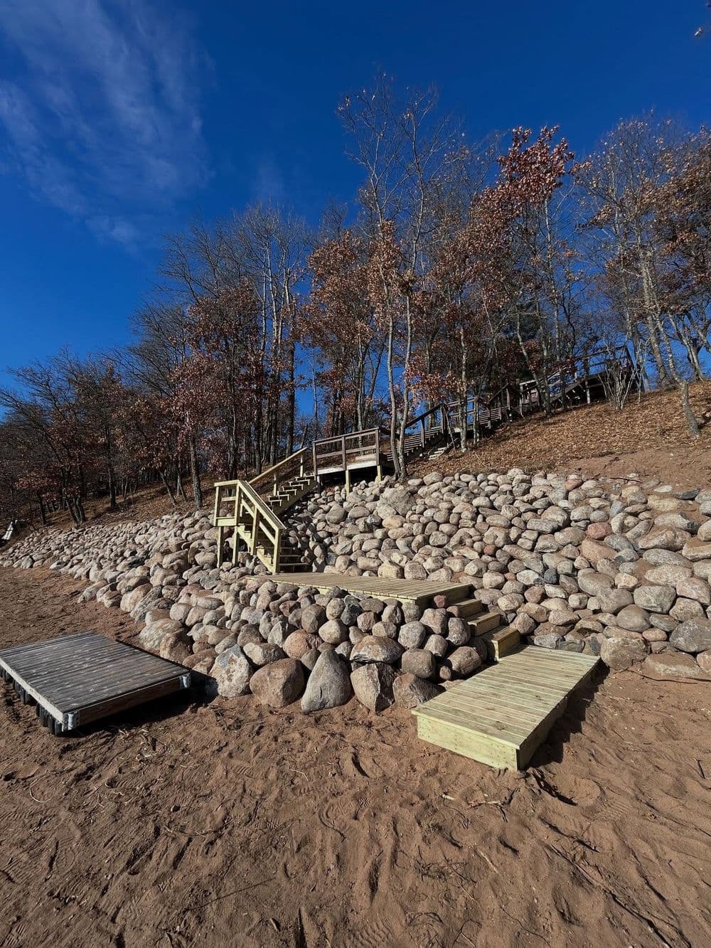 Gallery photos for 180-Foot Rip Rap Shoreline Wall With Floating Deck and Staircase: Image #1