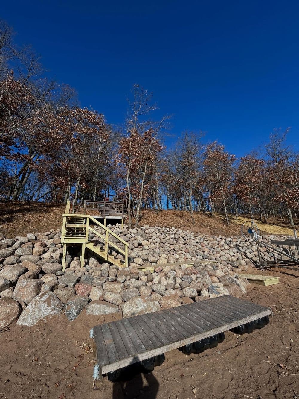 Gallery photos for 180-Foot Rip Rap Shoreline Wall With Floating Deck and Staircase: Image #2