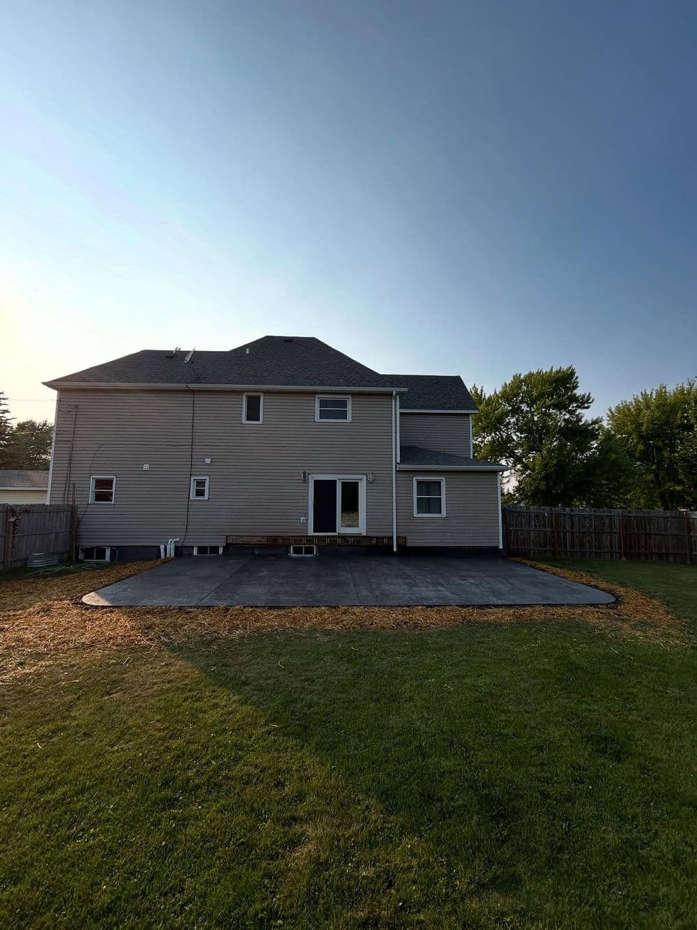 Gallery photos for Old Wooden Deck Replaced with Rock-Stamped Concrete Patio: Image #2