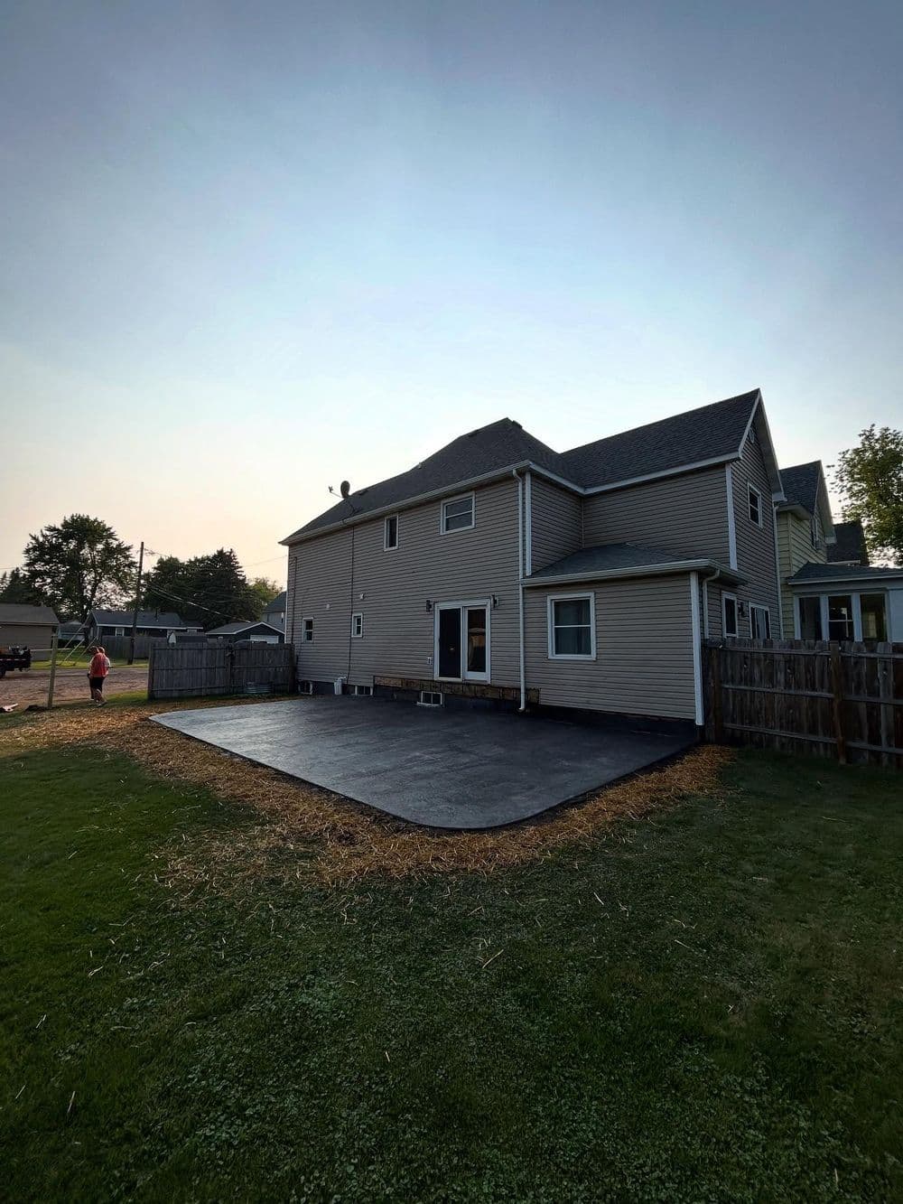 Gallery photos for Old Wooden Deck Replaced with Rock-Stamped Concrete Patio: Image #1