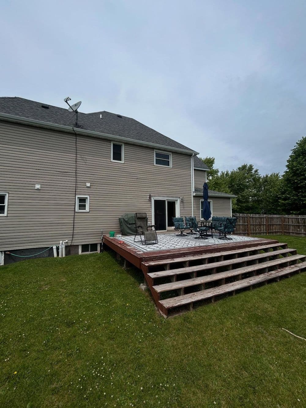 Gallery photos for Old Wooden Deck Replaced with Rock-Stamped Concrete Patio: Image #6